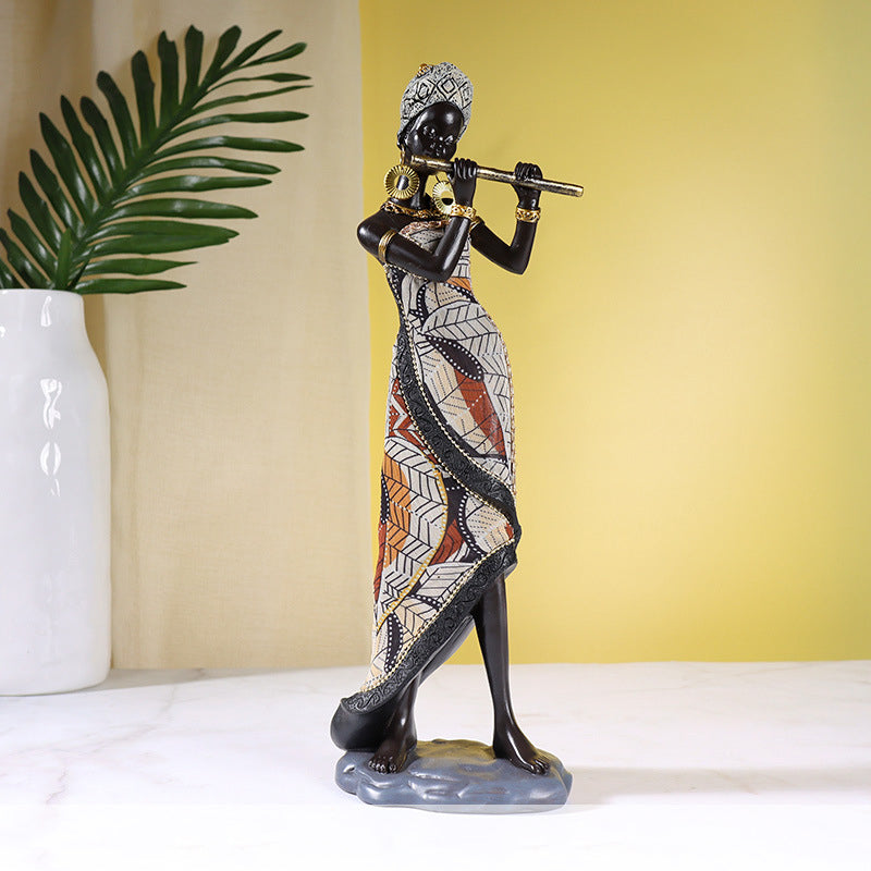 Afrikaanse vrouwelijke muzikant sculptuur