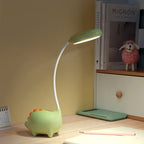 Opladen LED-bureaulamp met cartoon dino ogen zorg