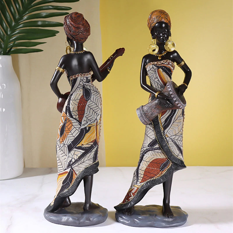 Afrikaanse vrouwelijke muzikant sculptuur