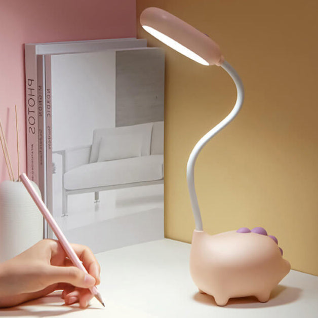 Opladen LED-bureaulamp met cartoon dino ogen zorg