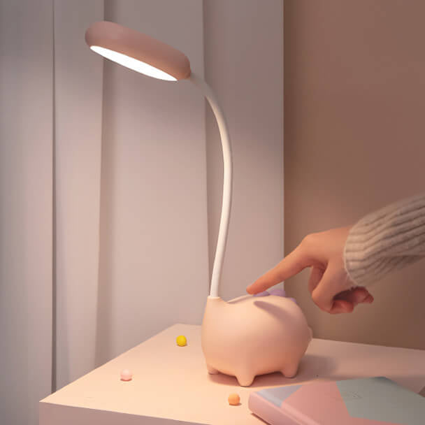 Opladen LED-bureaulamp met cartoon dino ogen zorg