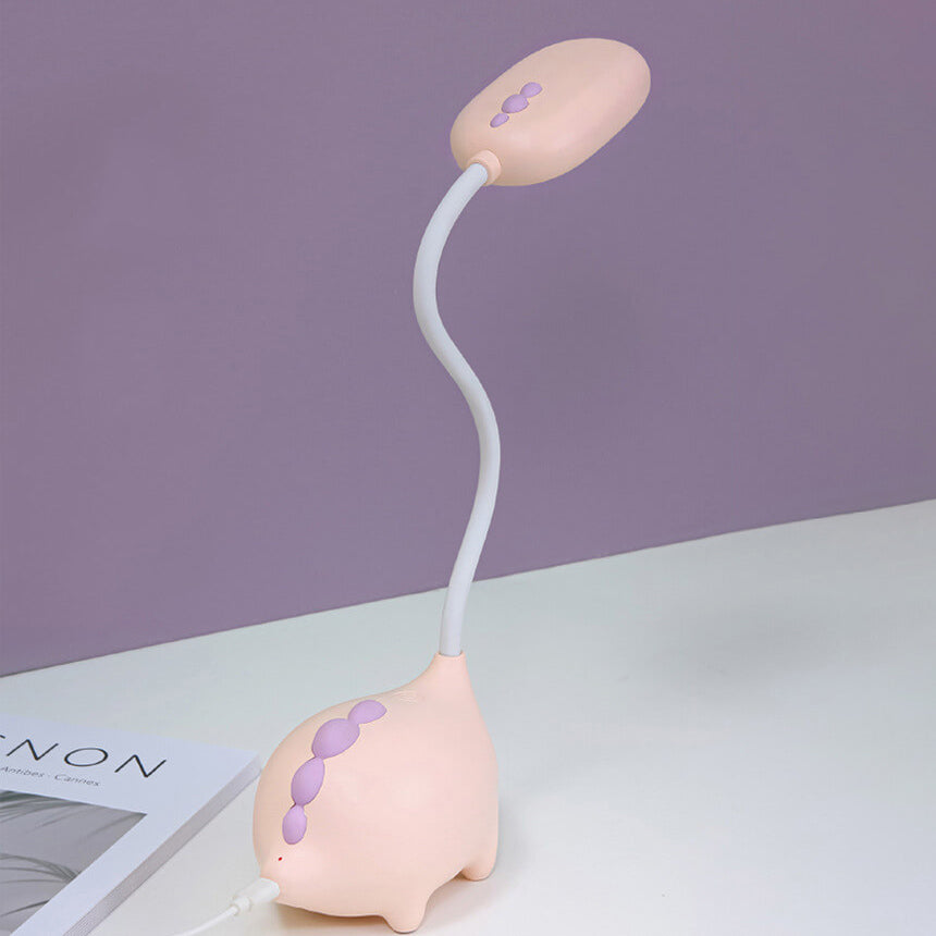 Opladen LED-bureaulamp met cartoon dino ogen zorg