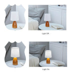 Scandinavische retro tafellamp met gevouwen kap en glazen voet
