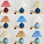 Noordse minimalistische 1-lamp tafellamp van keramiek met plooien