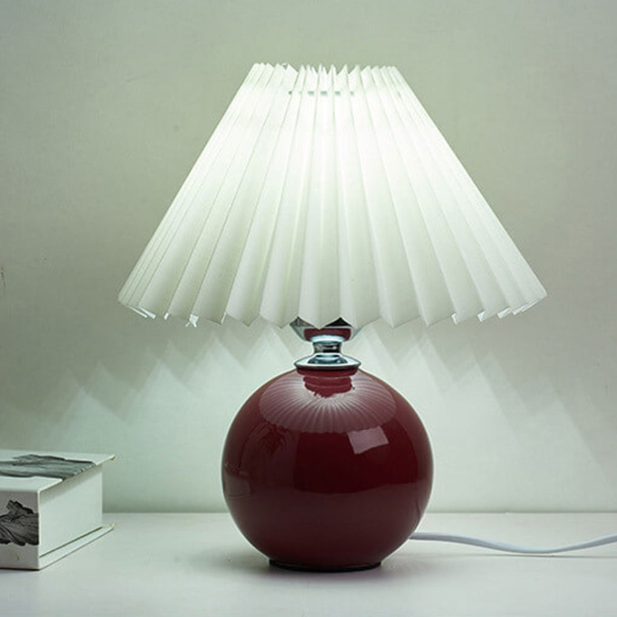 Noordse minimalistische 1-lamp tafellamp van keramiek met plooien