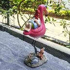 Flamingo rustgevende tuin gnome standbeeld