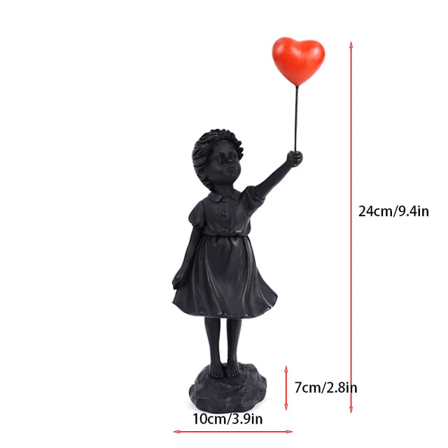 Beeldhouwwerk van een meisje met een ballon in Banksy-stijl voor tafeldecoratie en creatieve woonkamerdecoratie