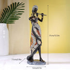 Afrikaanse vrouwelijke muzikant sculptuur