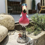 Flamingo rustgevende tuin gnome standbeeld