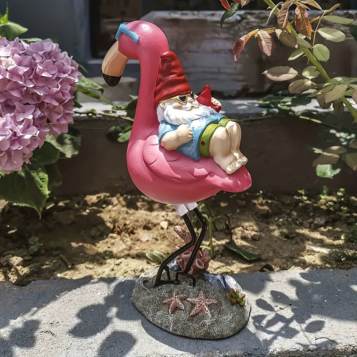 Flamingo rustgevende tuin gnome standbeeld